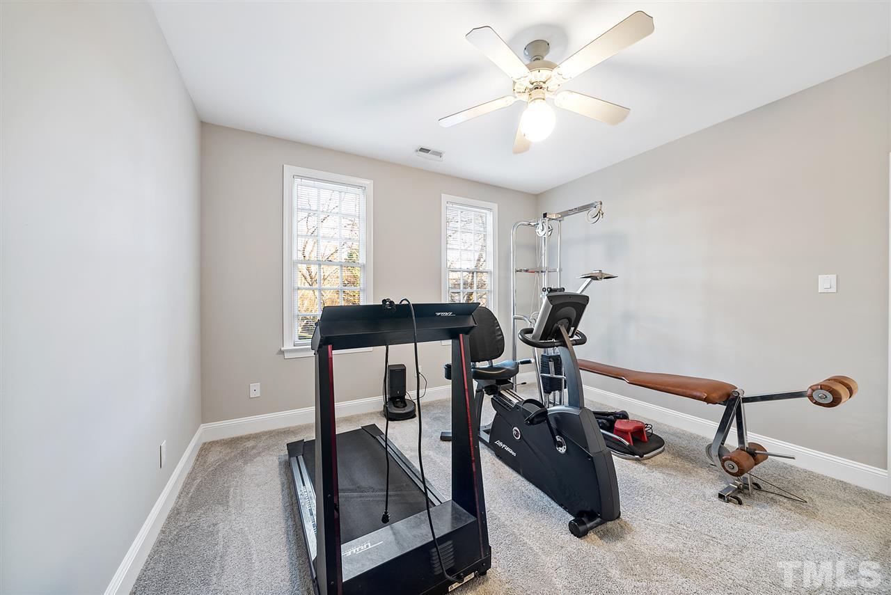 7605 Rainwater Road Raleigh, NC 27615 - Photo 21 of 30 a view of a workspace with furniture and a window