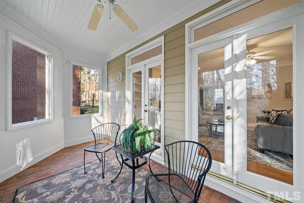7605 Rainwater Road Raleigh, NC 27615 - Photo 27 of 30 a view of a dining room with furniture window and wooden floor