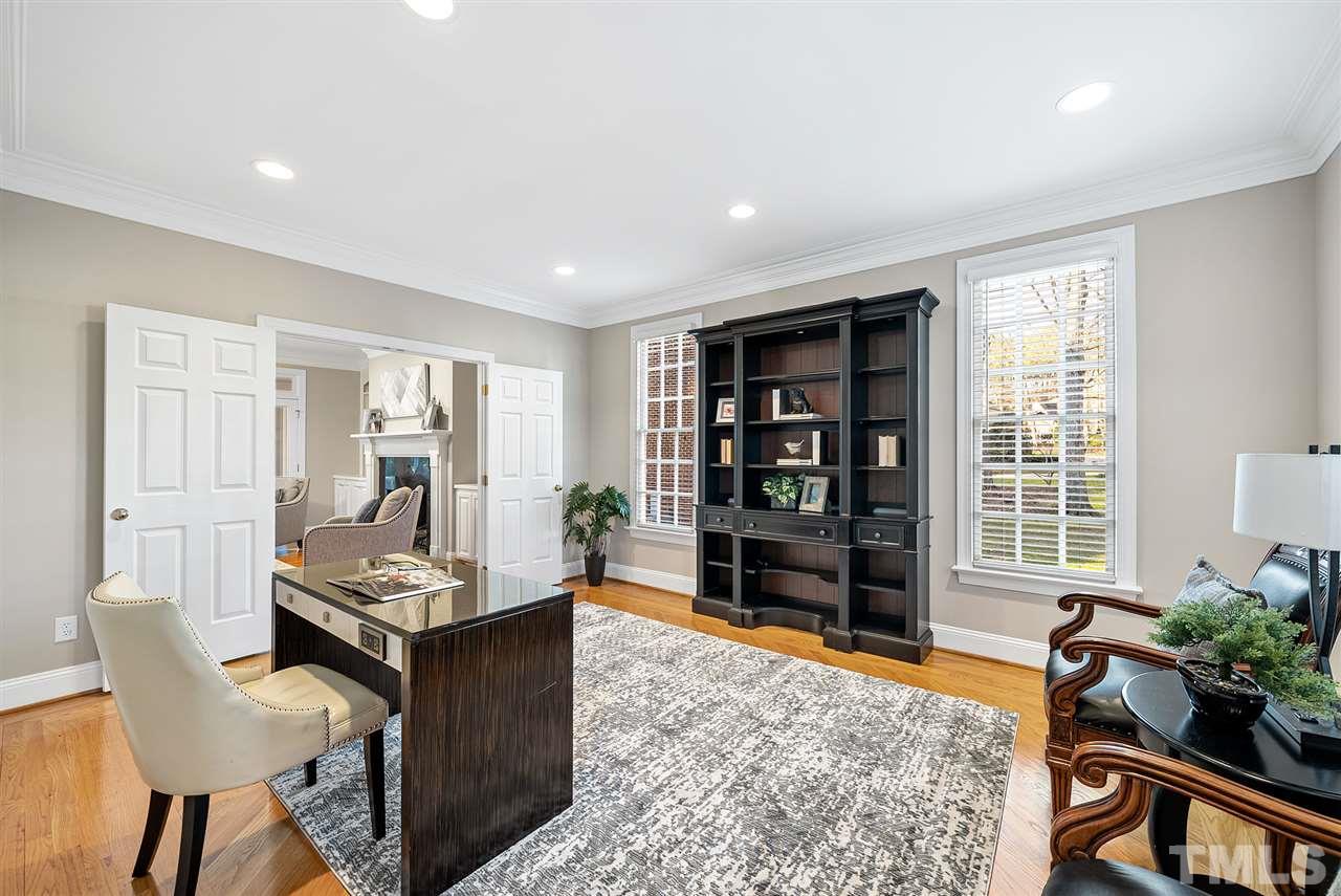 7605 Rainwater Road Raleigh, NC 27615 - Photo 5 of 30 a living room with furniture and wooden floor
