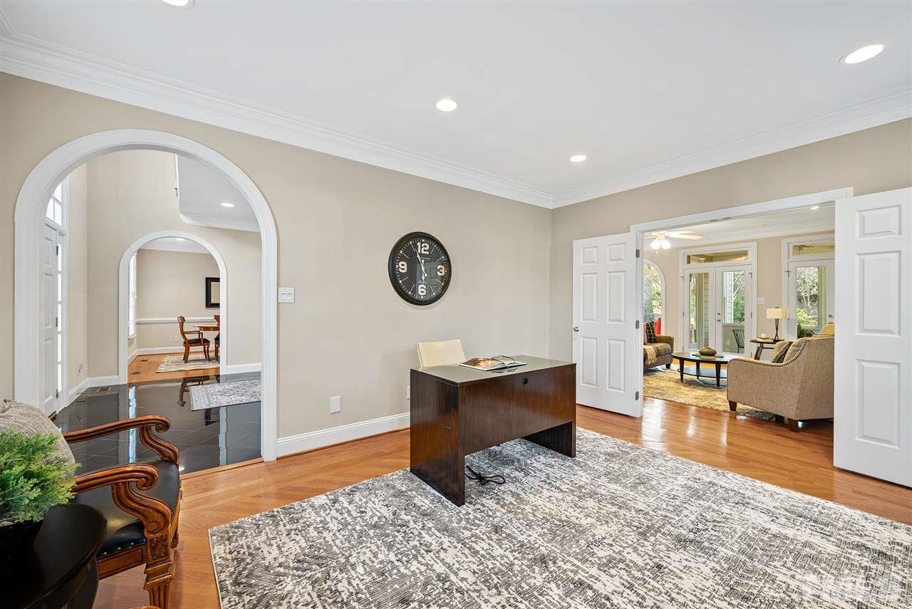 7605 Rainwater Road Raleigh, NC 27615 - Photo 6 of 30 a living room with furniture and a large window