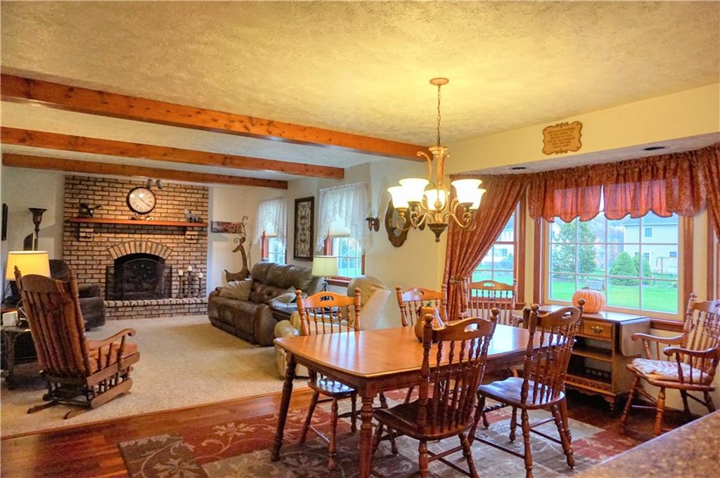 212 Holyoke Road Butler, PA 16001 - Photo 11 of 25 The family room is complimented with wood beams!