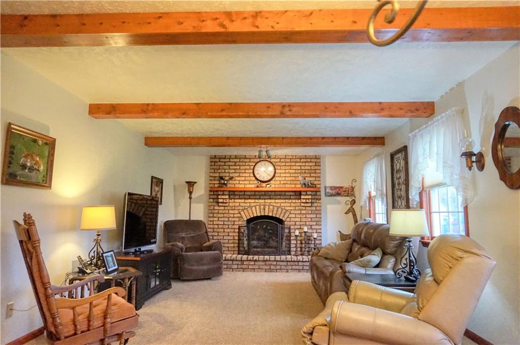212 Holyoke Road Butler, PA 16001 - Photo 13 of 25 The floor to ceiling brick fireplace is gas!