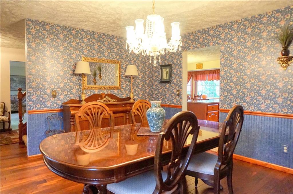 212 Holyoke Road Butler, PA 16001 - Photo 17 of 25 Formal dining room with beautiful hardwood floors!