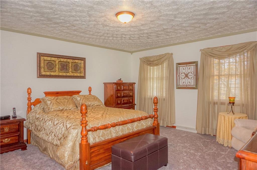 212 Holyoke Road Butler, PA 16001 - Photo 19 of 25 Large master suite with crown molding and brand new carpet!