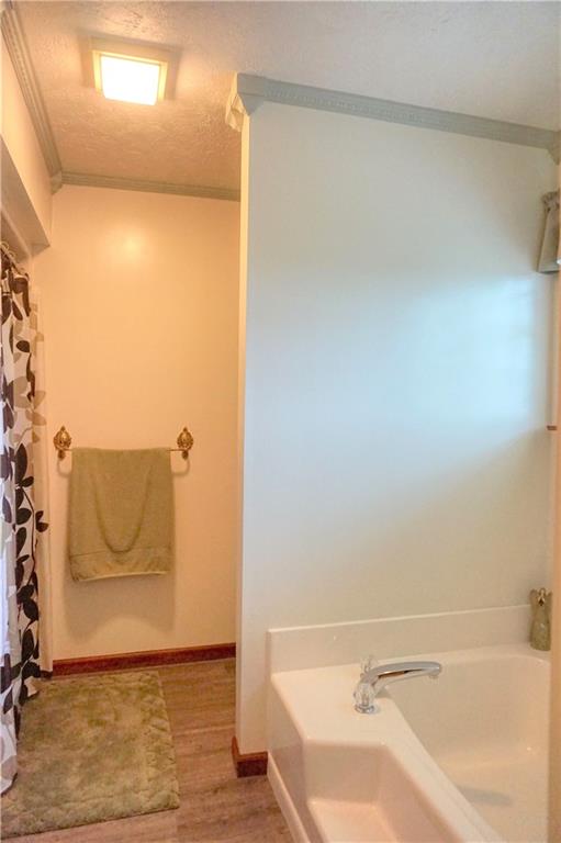212 Holyoke Road Butler, PA 16001 - Photo 21 of 25 The soaking tub to the right and walk-in shower to the left!