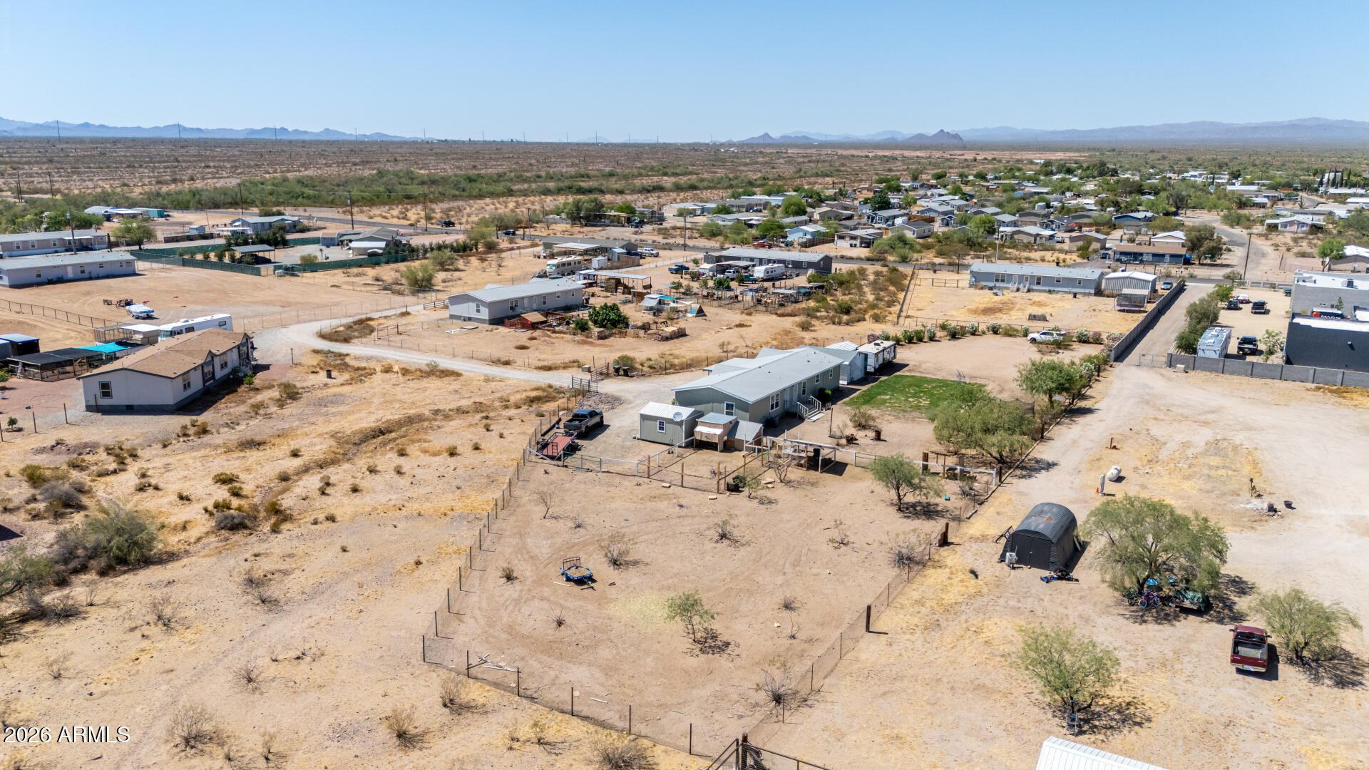 22417 West Dove Valley Road Wittmann, AZ 85361 - Photo 47 of 53 a view of a lake with beach