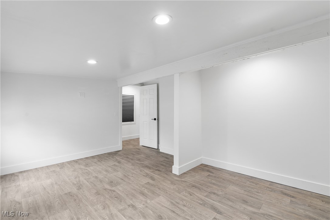8177 South Cleveland Massillon Road, Unit 55 Clinton, OH 44216 - Photo 22 of 32 Spare room featuring light hardwood / wood-style flooring