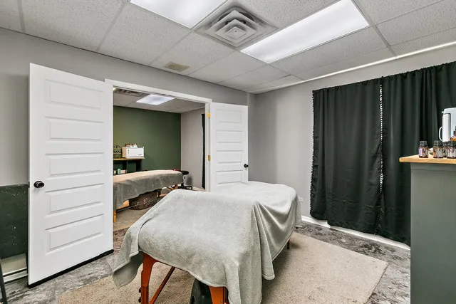 a bedroom with a bed and a closet