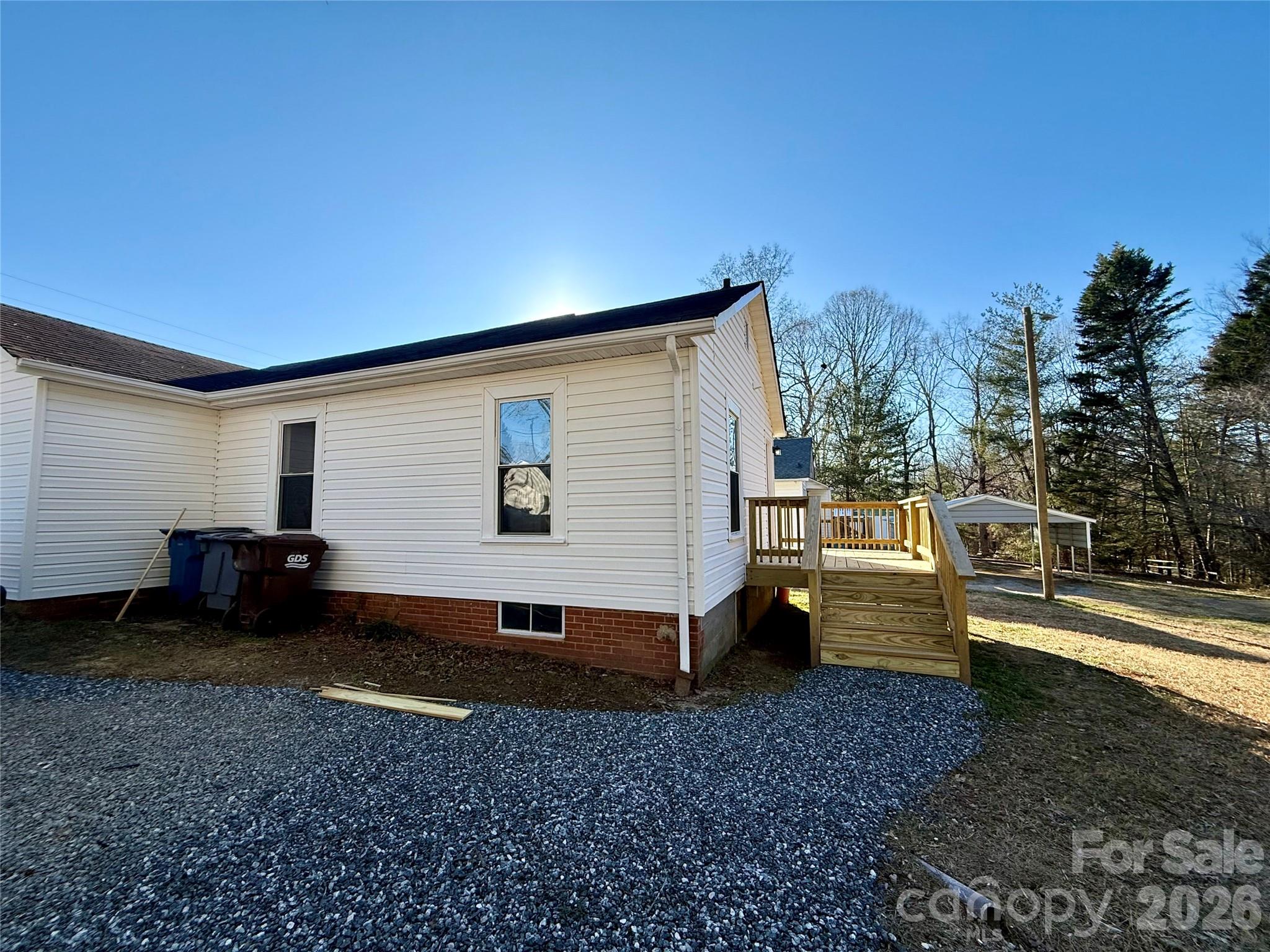 438 Pop Davis Road Taylorsville, NC 28681 - Photo 28 of 31 a view of a house with backyard and sitting area
