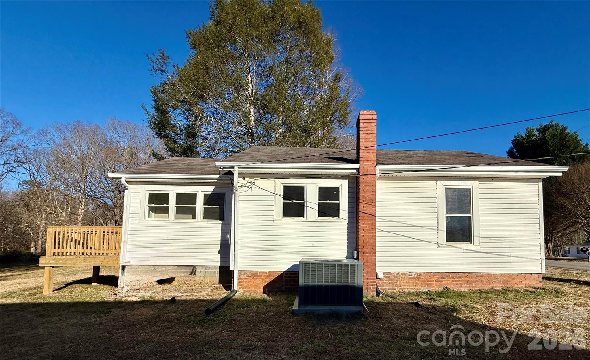 438 Pop Davis Road Taylorsville, NC 28681 - Photo 30 of 31 a view of a house with a yard