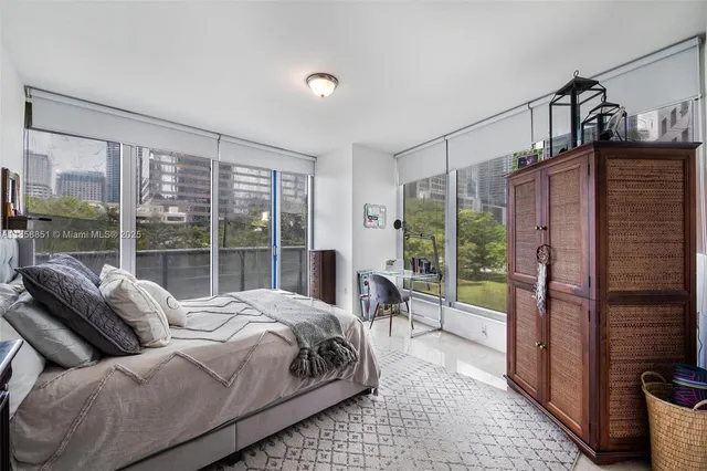 a bedroom with a bed and furniture