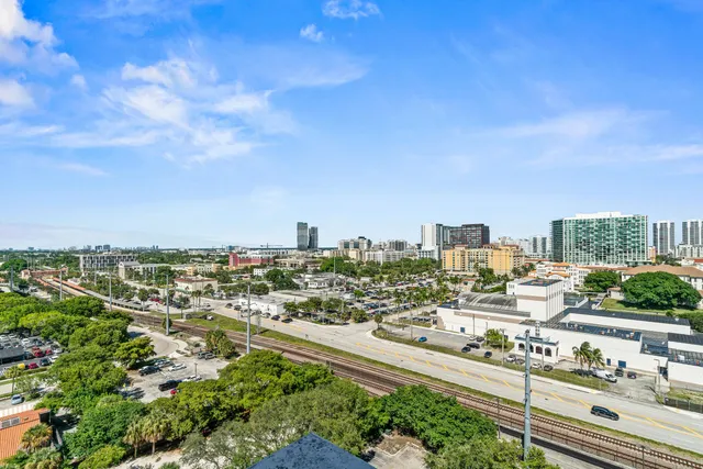 a view of swimming pool with outdoor seating