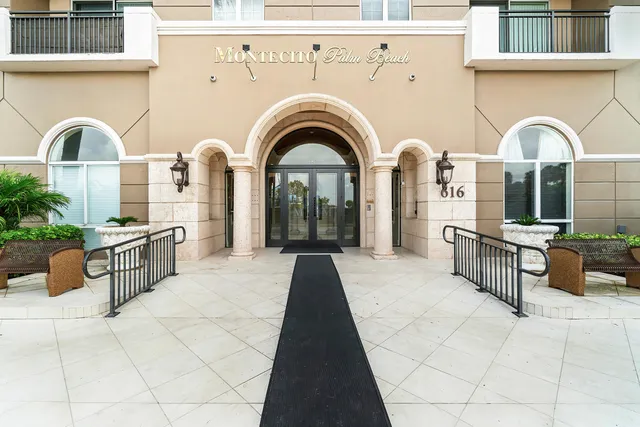 a bathroom with a window and a shower curtain