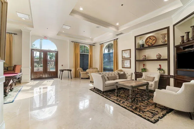 a view of a patio with chairs and tables