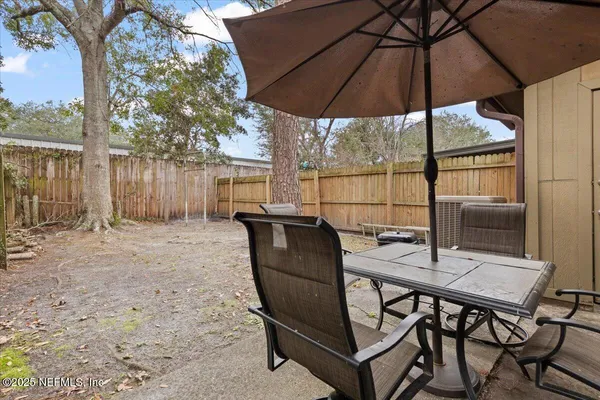 a view of an outdoor space with furniture
