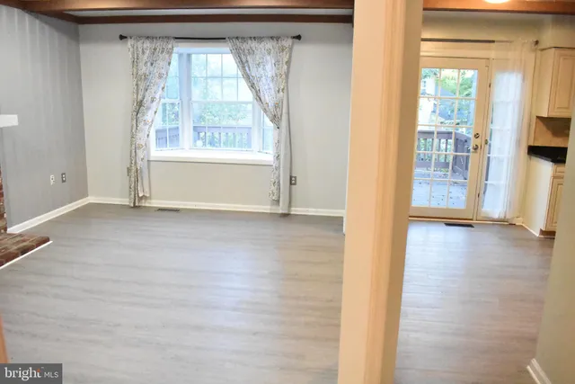 a bathroom with a sink and a window