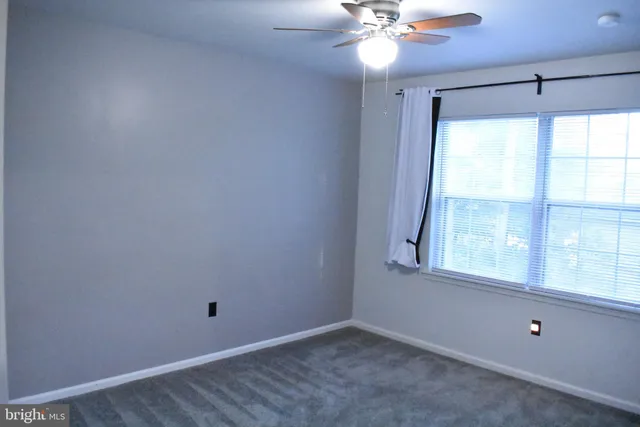 a view of a hallway with entryway