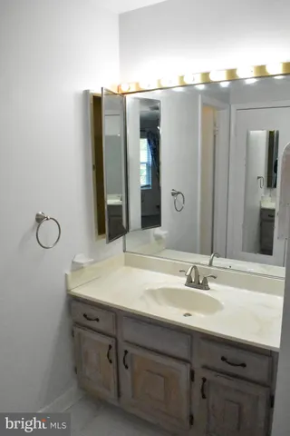 a bathroom with a shower and a shower