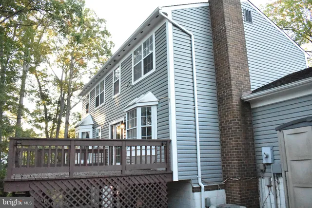 a front view of a house with garage