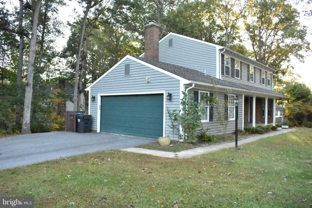 a view of a porch with wooden floor
