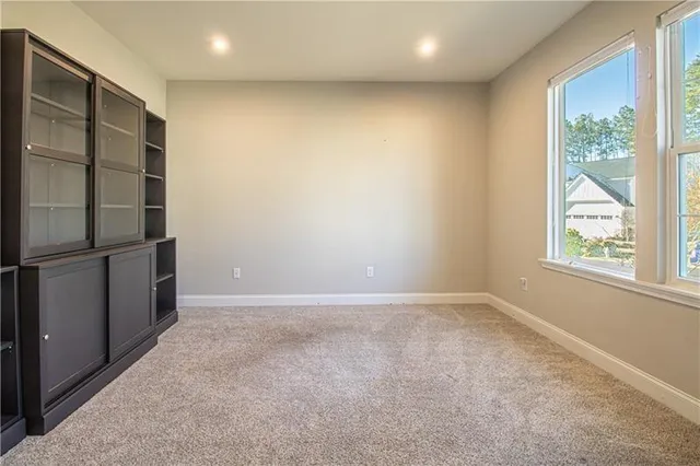 an empty room with windows