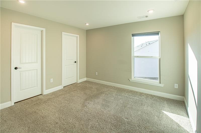 7950 Welch Mill Ball Ground, GA 30107 - Photo 21 of 32 a view of an empty room with a window