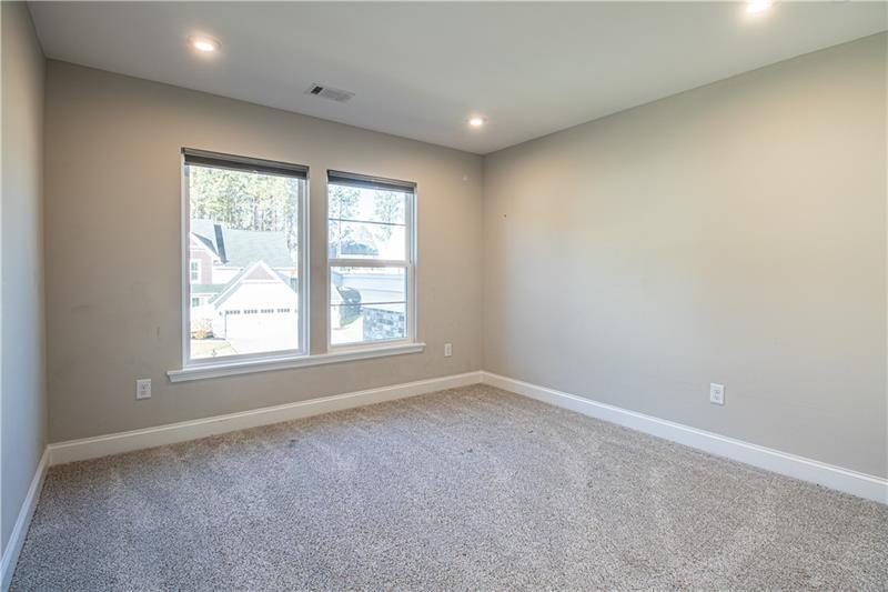 7950 Welch Mill Ball Ground, GA 30107 - Photo 24 of 32 an empty room with a window