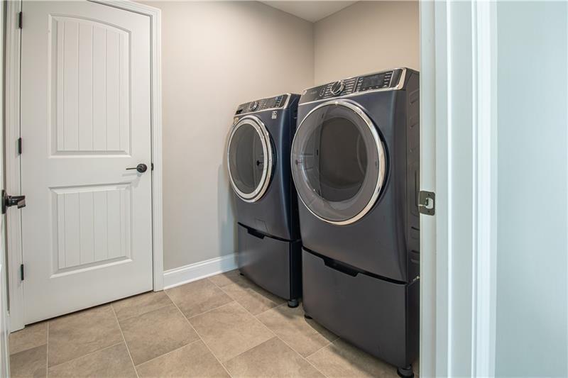 7950 Welch Mill Ball Ground, GA 30107 - Photo 30 of 32 a utility room with dryer and washer