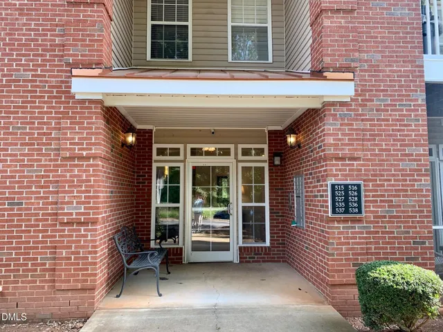 a view of front door of house with a window