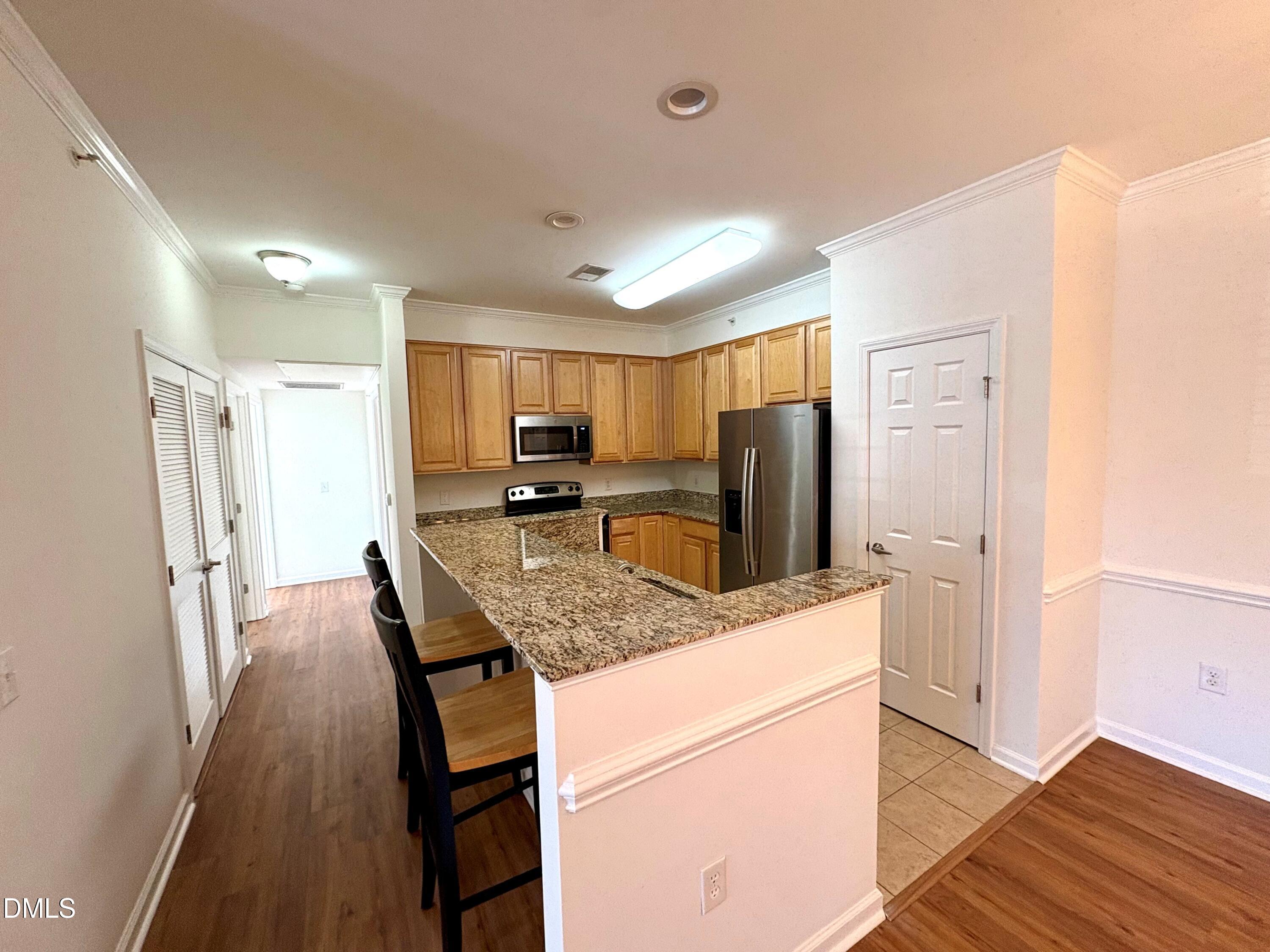 535 Weather Ridge Lane, Unit 535 Cary, NC 27513 - Photo 6 of 16 kitchen 2026