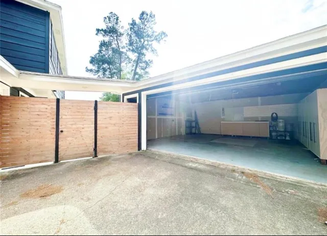 a view of backyard and utility room