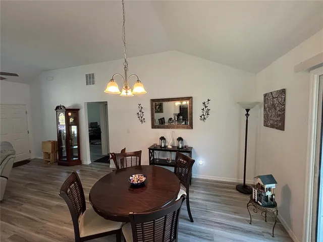 a view of a dining room with furniture