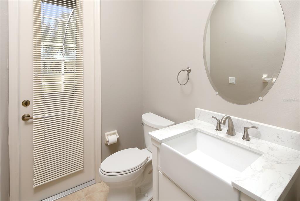 23 West Mickey Mantle Path Hernando, FL 34442 - Photo 20 of 53 a white toilet sitting next to a bathroom sink