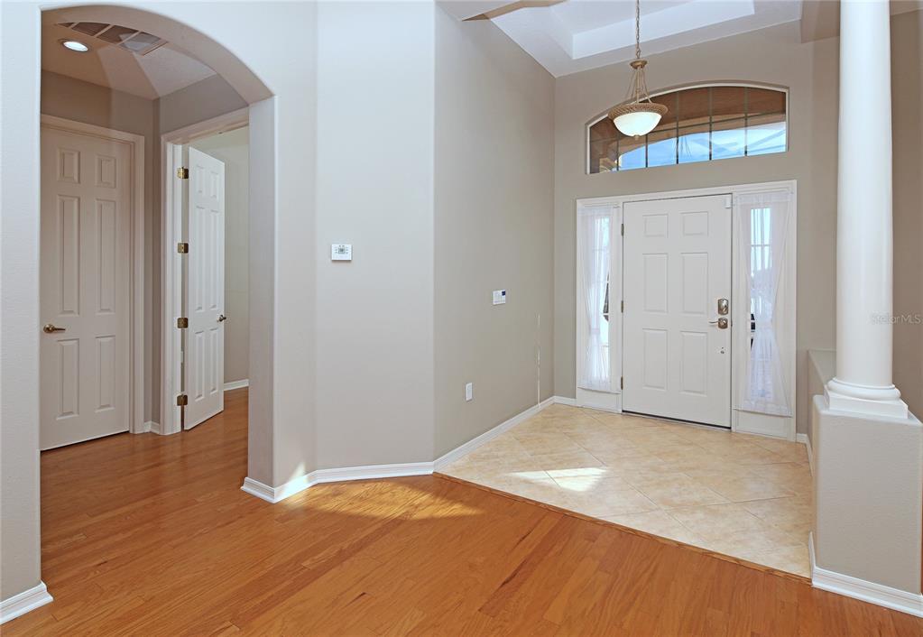23 West Mickey Mantle Path Hernando, FL 34442 - Photo 3 of 53 a view of a room with wooden floor and window