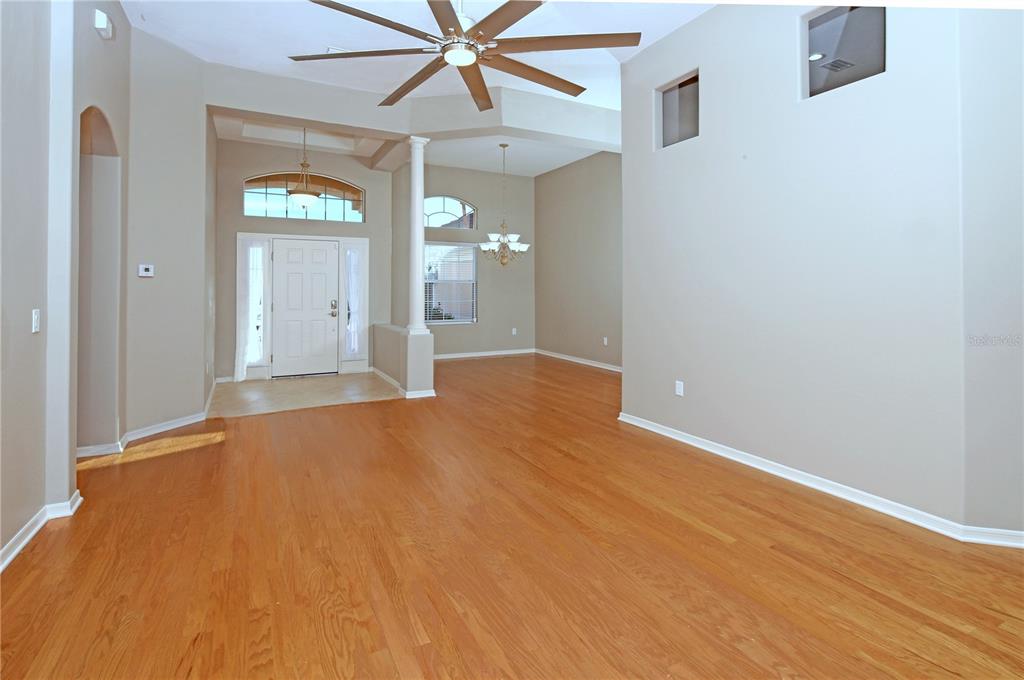 23 West Mickey Mantle Path Hernando, FL 34442 - Photo 5 of 53 a view of a big room with wooden floor and cabinet