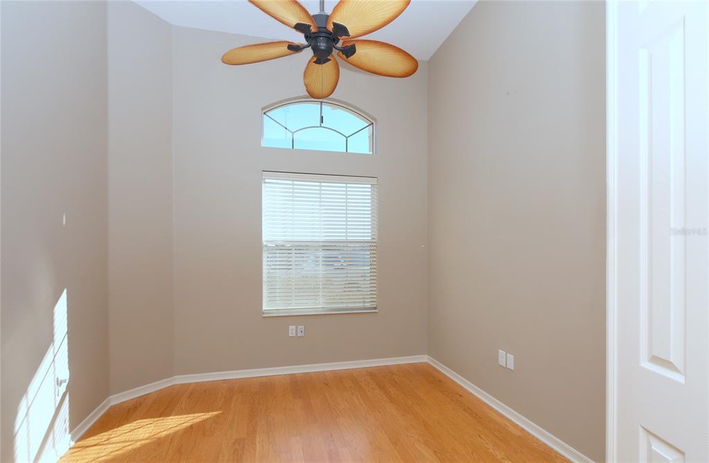 23 West Mickey Mantle Path Hernando, FL 34442 - Photo 7 of 53 a view of a room with window and chandelier fan