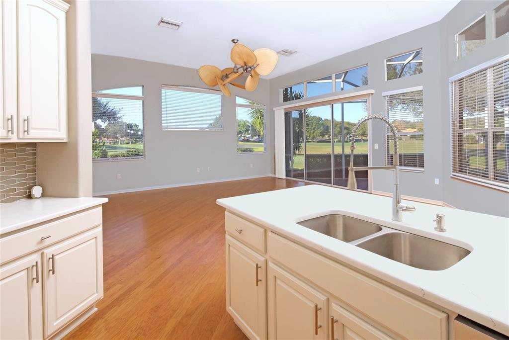 23 West Mickey Mantle Path Hernando, FL 34442 - Photo 10 of 53 a kitchen with a sink and large window