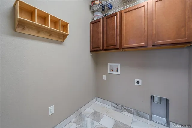 a view of cabinets and utility room