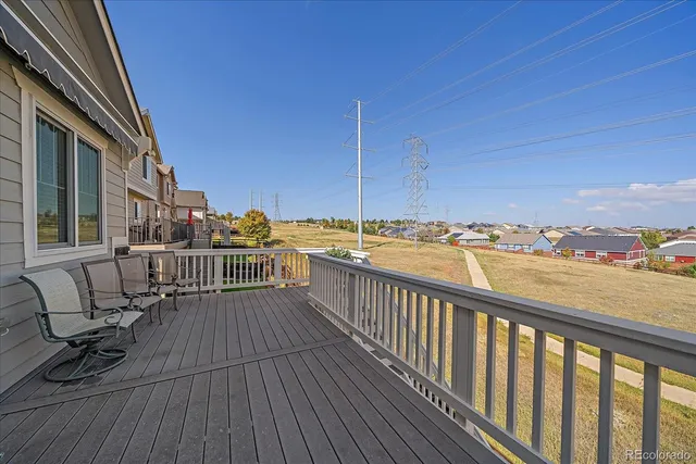 a view of balcony with furniture