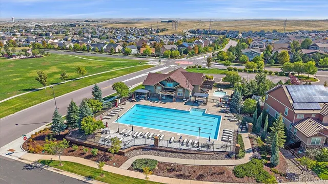 a house with trees in the background