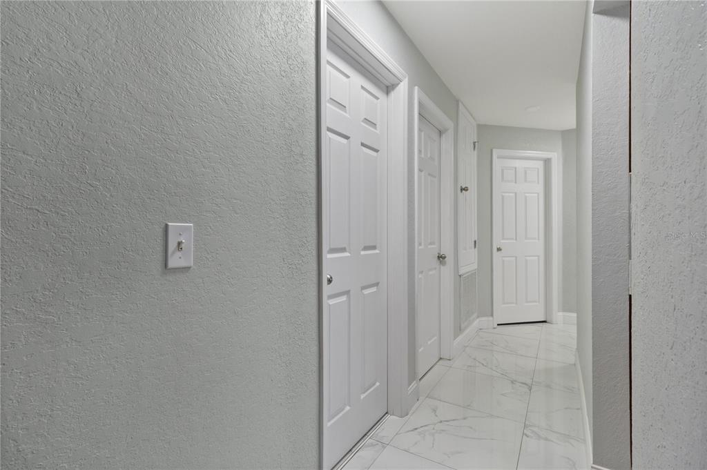 12374 Corrine Avenue Spring Hill, FL 34609 - Photo 22 of 28 a view of a hallway