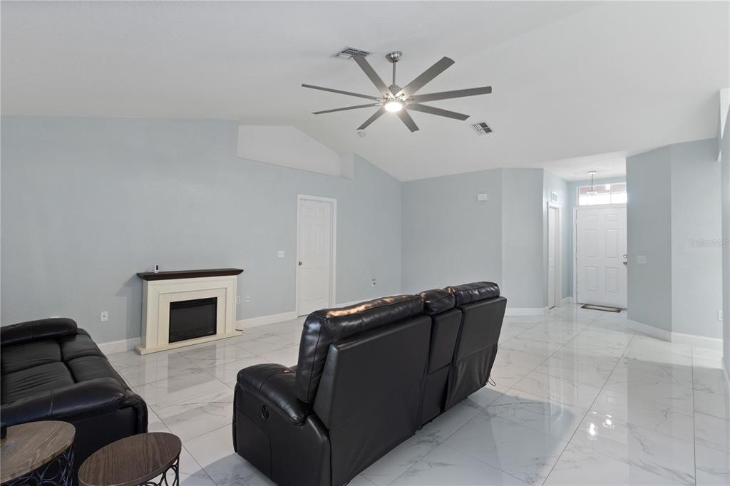 12374 Corrine Avenue Spring Hill, FL 34609 - Photo 23 of 28 a living room with furniture