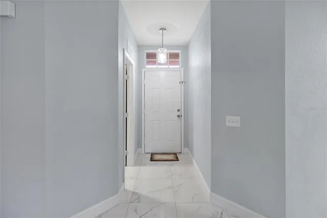 a white bath tub sitting in a bathroom