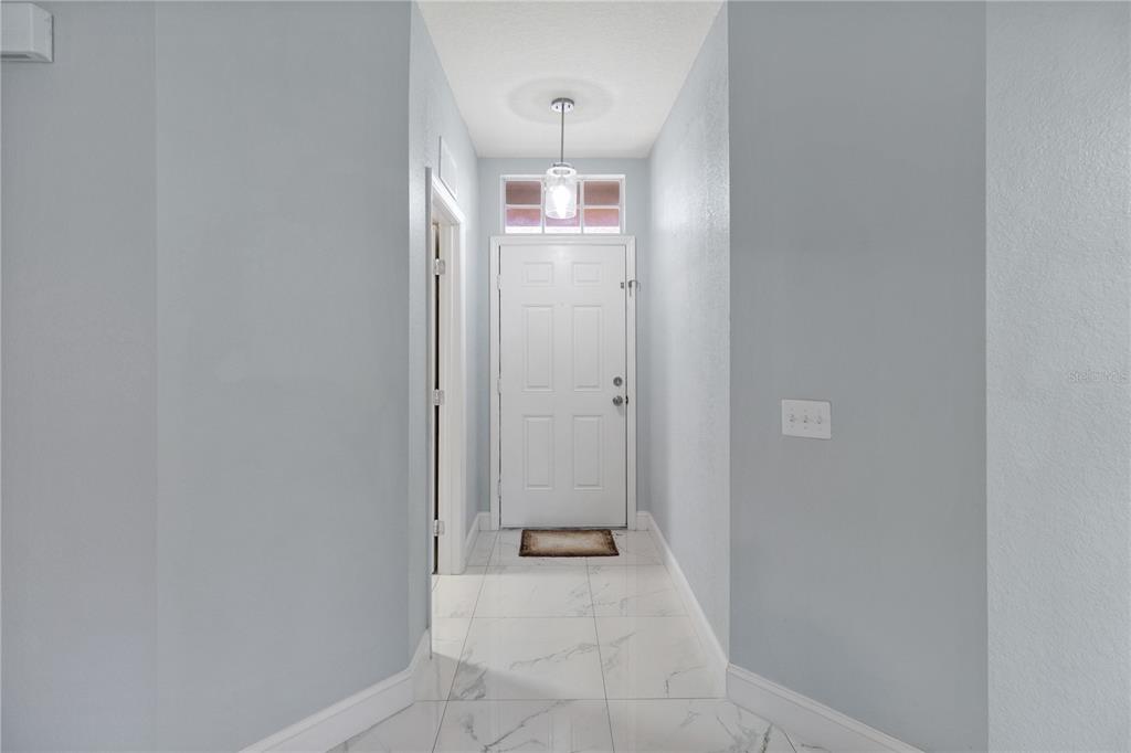 12374 Corrine Avenue Spring Hill, FL 34609 - Photo 9 of 28 a view of a room with an empty space