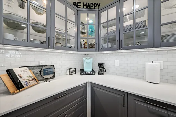 a bathroom with a sink and a window