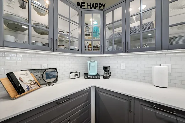 a bathroom with a sink and a window