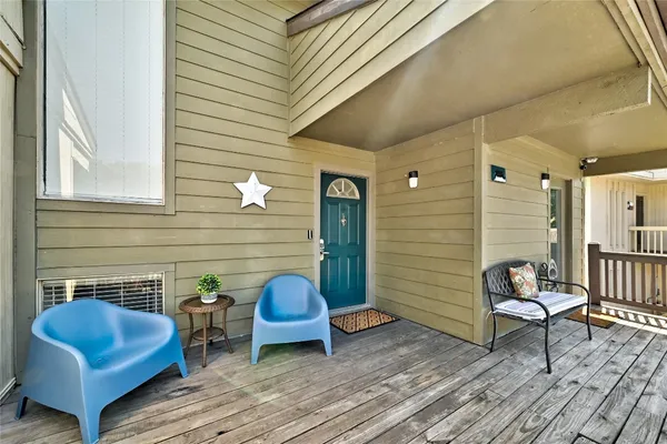 a view of a chairs in a balcony