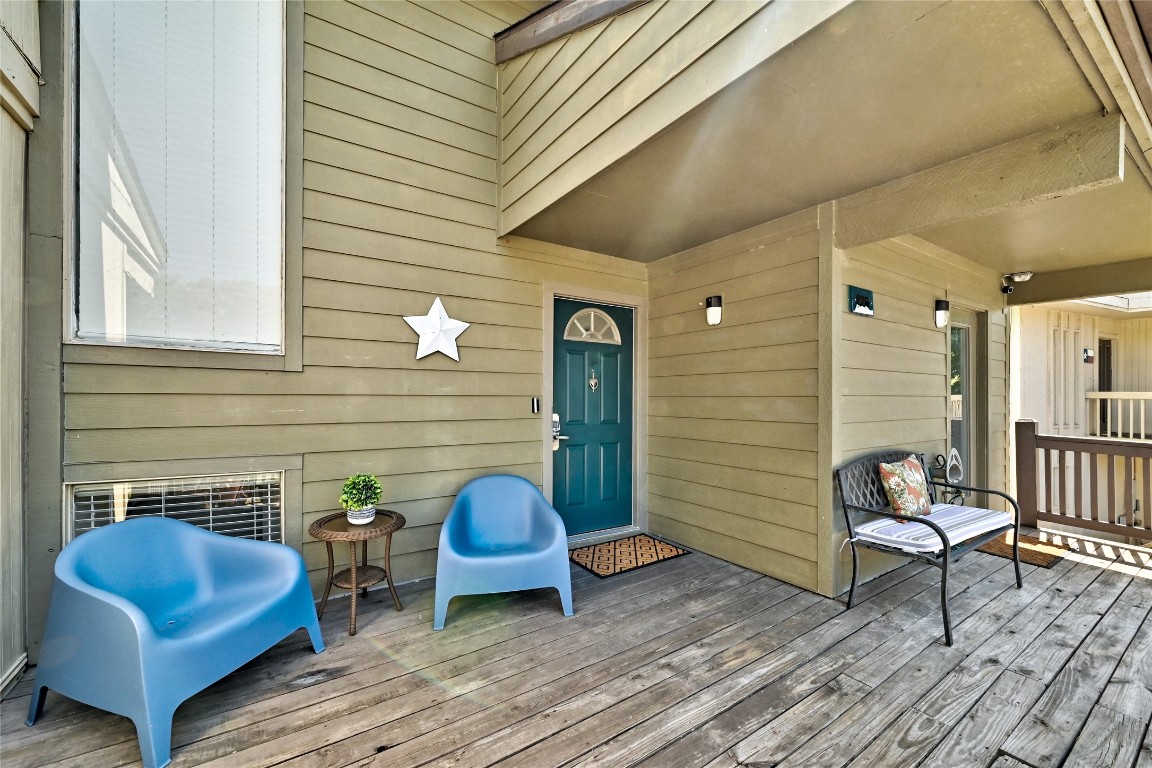 225 Comanche Lane Point Venture, TX 78645 - Photo 2 of 40 a view of a chairs in a balcony