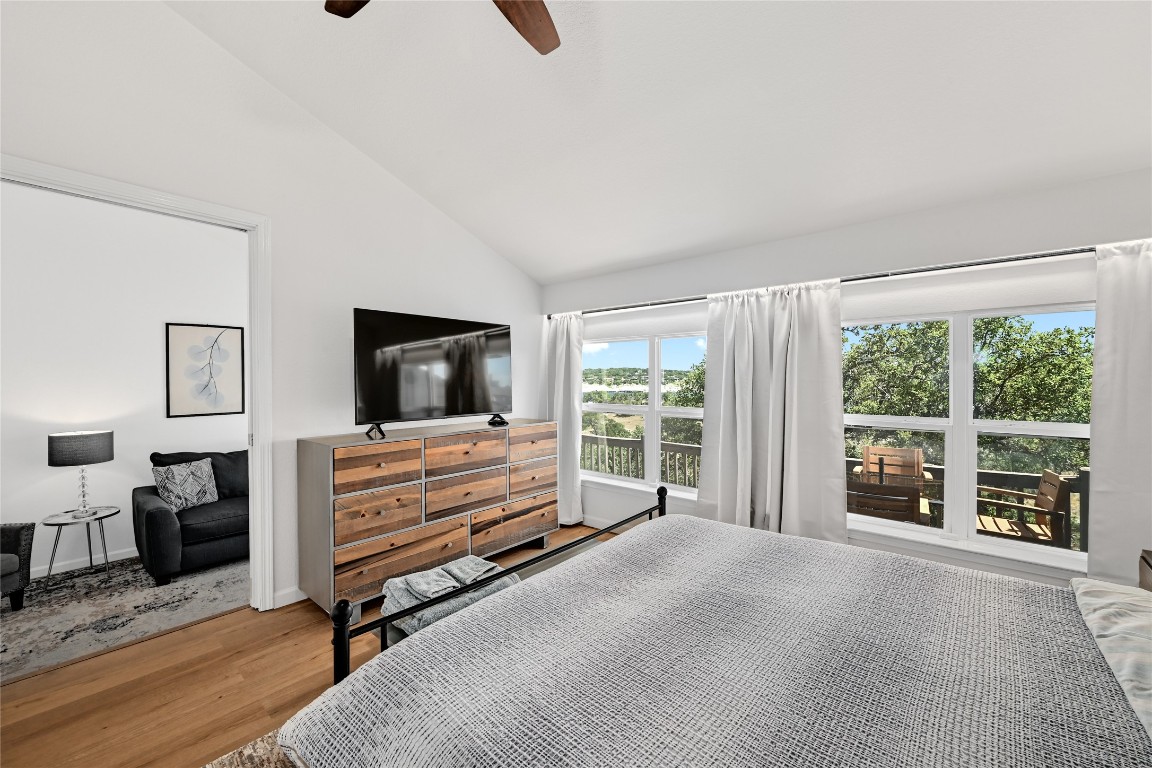 225 Comanche Lane Point Venture, TX 78645 - Photo 21 of 40 a living room with furniture and a flat screen tv