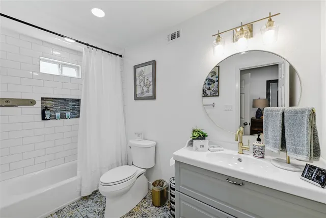 a view of living room with furniture and flowers